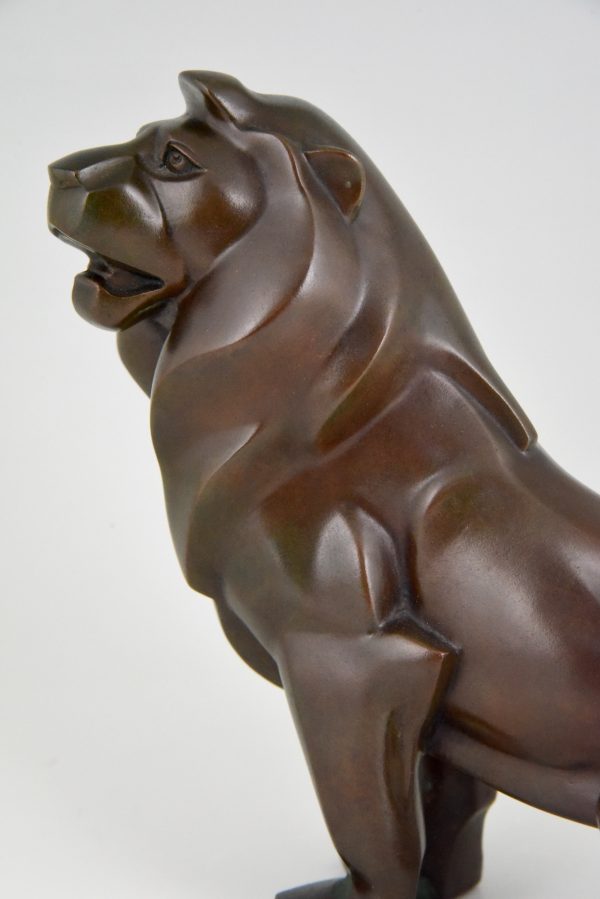 Art Deco bronze sculpture of a lion.