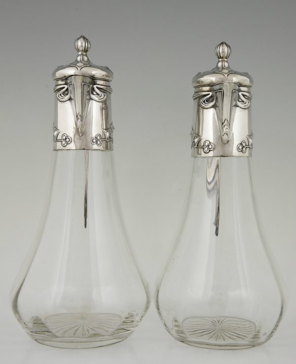 A pair silver Art Nouveau decanters