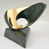 Abstract bronze oval shaped sculpture.