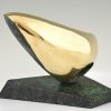 Abstract bronze oval shaped sculpture.