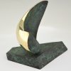 Abstract bronze oval shaped sculpture.