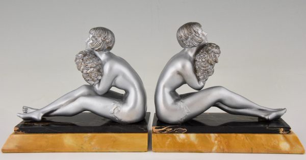 Art Deco bookends seated nudes with flowers