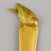 Art Deco bronzen briefopener met vogel.