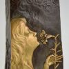 Art Nouveau bronze vase with woman’s face and flowers