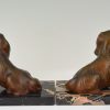 Art Deco bronzen boekensteunen met King Charles spaniel honden