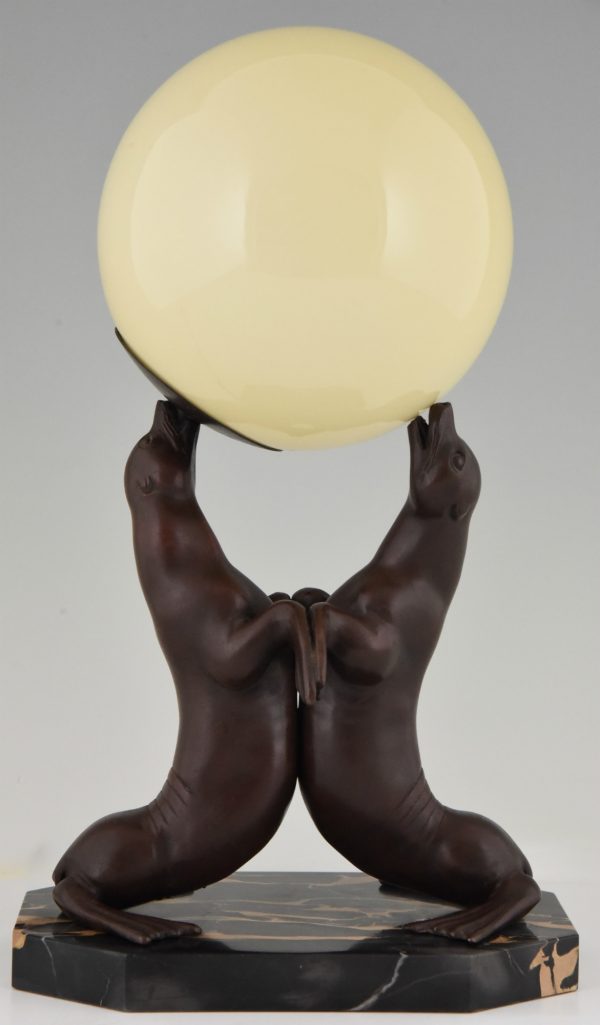 Art Deco lamp of two seal playing with a ball