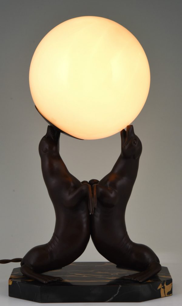 Art Deco lamp of two seal playing with a ball