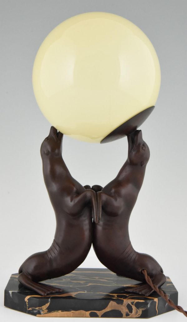 Art Deco lamp of two seal playing with a ball