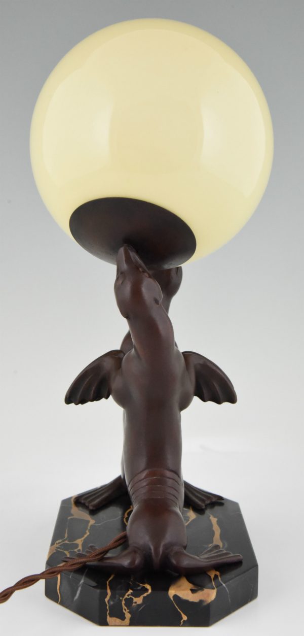 Art Deco lamp of two seal playing with a ball