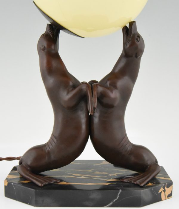 Art Deco lamp of two seal playing with a ball