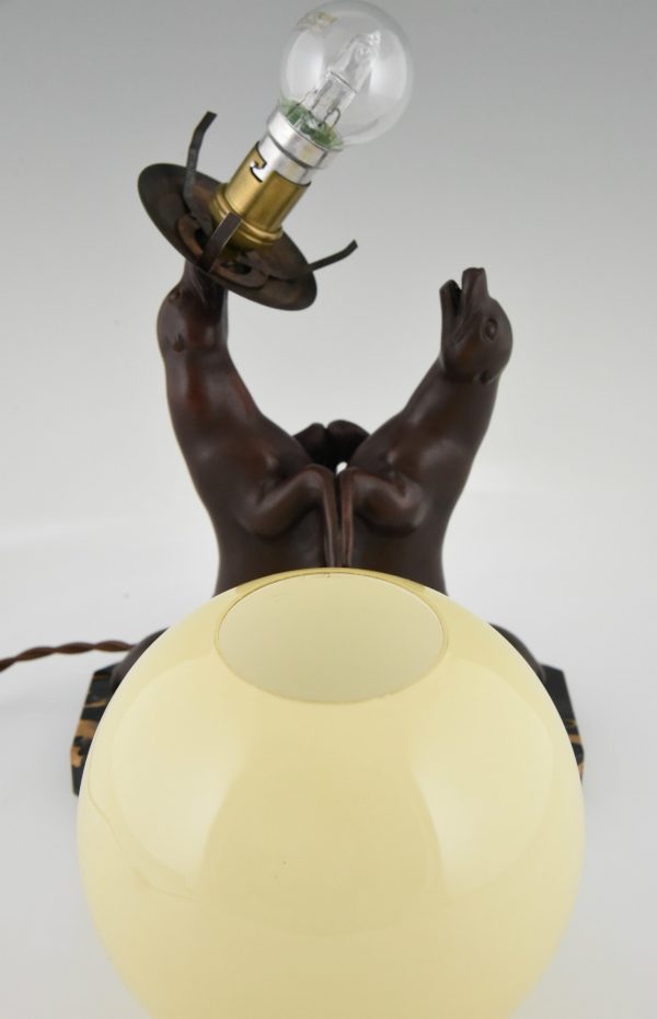 Art Deco lamp of two seal playing with a ball