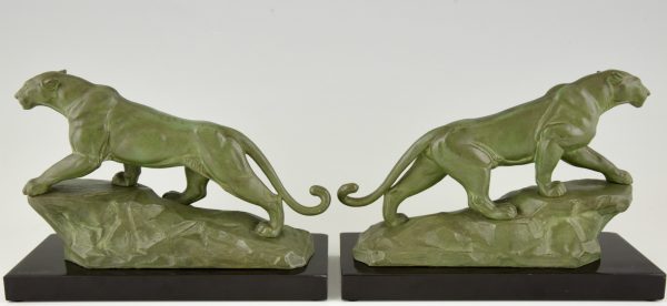 Art Deco panther bookends.