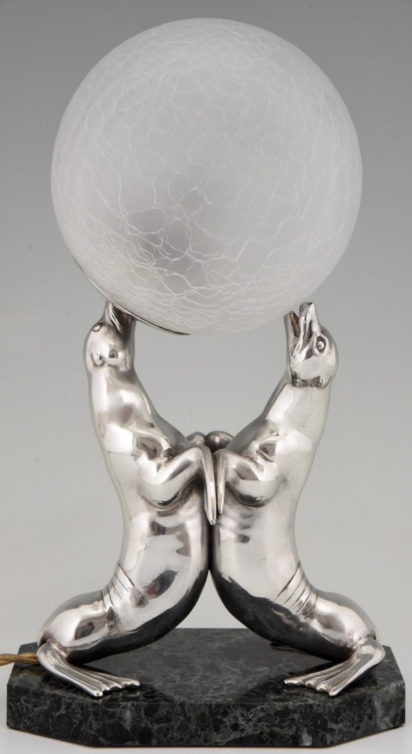 Art Deco silvered lamp of two seal playing with a ball