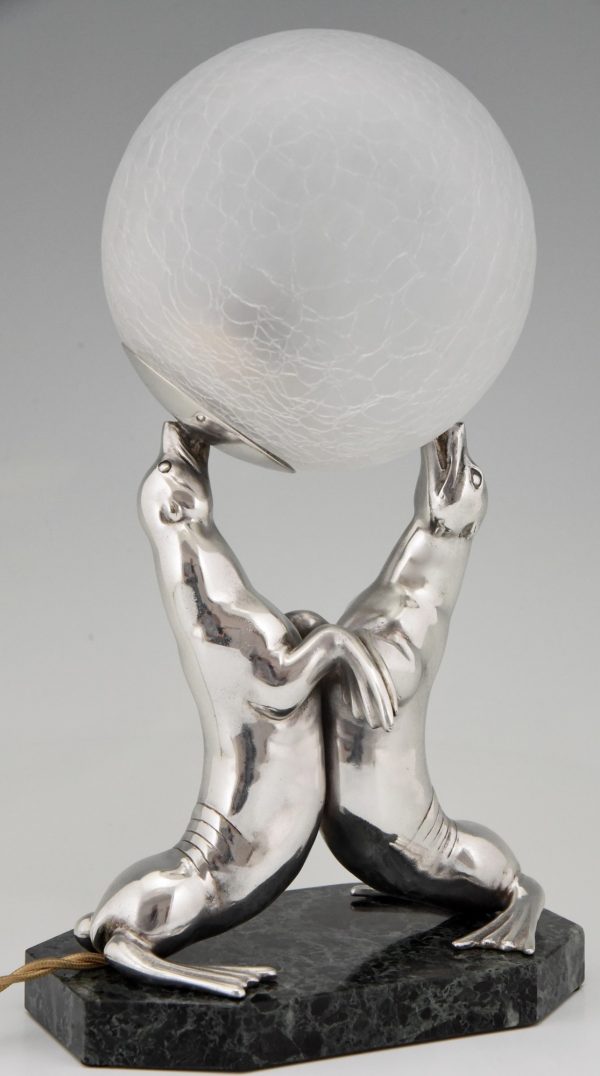 Art Deco silvered lamp of two seal playing with a ball