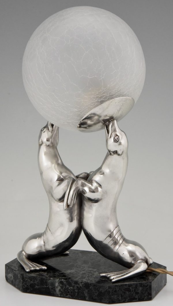 Art Deco silvered lamp of two seal playing with a ball