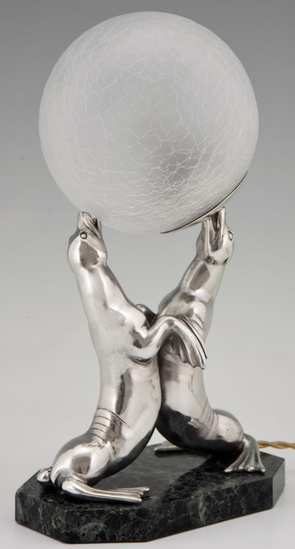 Art Deco silvered lamp of two seal playing with a ball