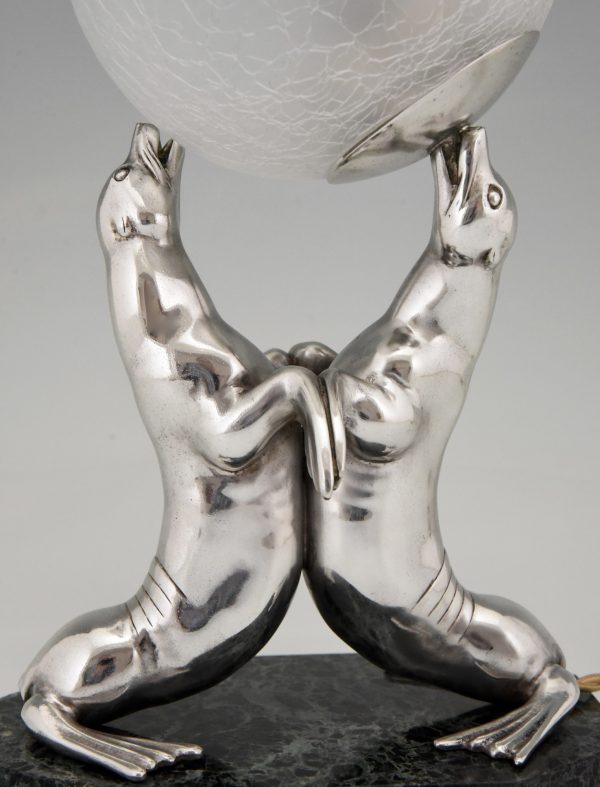 Art Deco silvered lamp of two seal playing with a ball