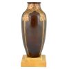 Art Deco bronzen vaas op marmeren sokkel.