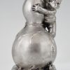 Bronze sculpture of a baby boy on a vase with mice.