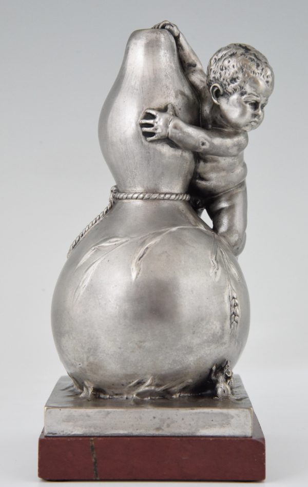 Sculpture en bronze vase avec petit garçon et souris.