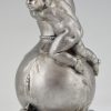 Bronze sculpture of a baby boy on a vase with mice.