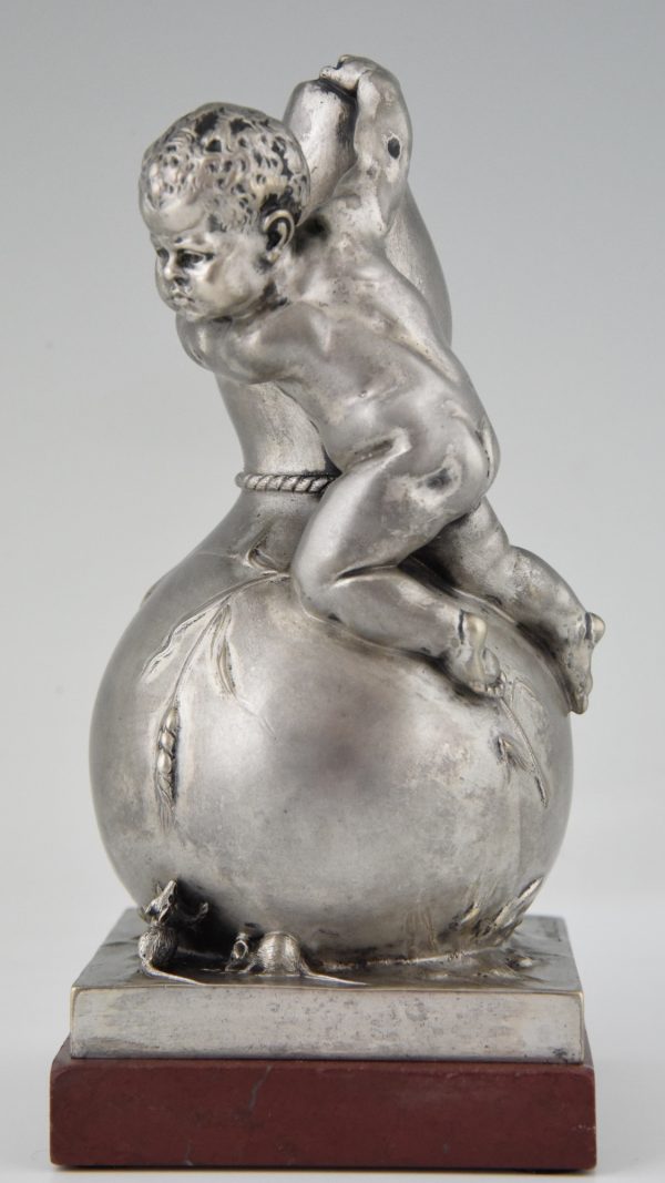 Bronze sculpture of a baby boy on a vase with mice.