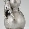 Bronze sculpture of a baby boy on a vase with mice.