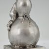 Bronze sculpture of a baby boy on a vase with mice.