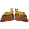 Bronzen boekensteunen met katten
