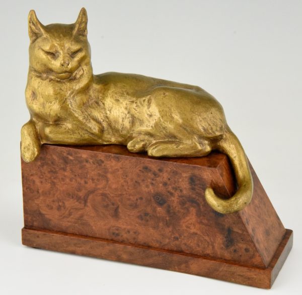 Bronzen boekensteunen met katten