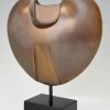 Abstract bronze sculpture on marble base