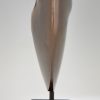 Abstract bronze sculpture on marble base