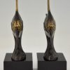 Art Deco boekensteunen met vissen