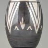 Art Deco Dinanderie vase with stylized geometric design.