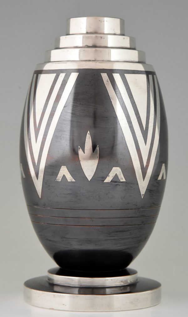 Art Deco Dinanderie vase with stylized geometric design.
