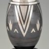 Art Deco Dinanderie vase with stylized geometric design.