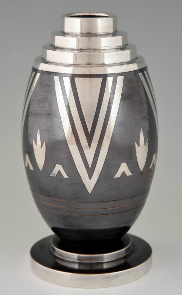 Art Deco Dinanderie vase with stylized geometric design.