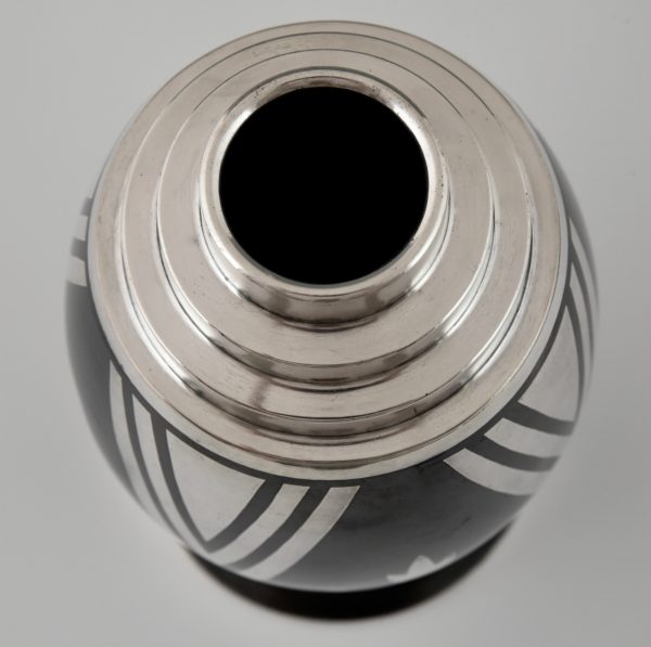 Art Deco Dinanderie vase with stylized geometric design.