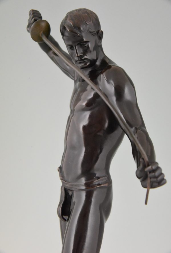 Sculpture en bronze escrimeur nu masculin