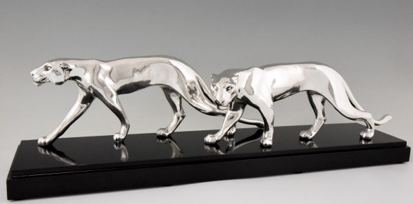 Art Deco silvered sculpture of two panthers