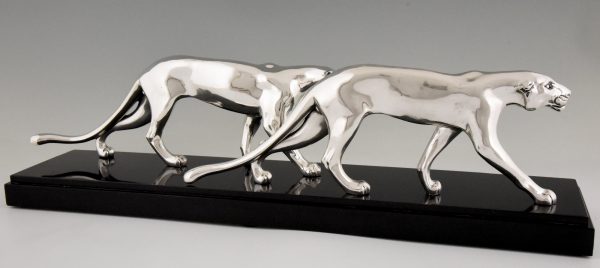 Art Deco silvered sculpture of two panthers