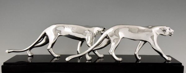 Art Deco silvered sculpture of two panthers