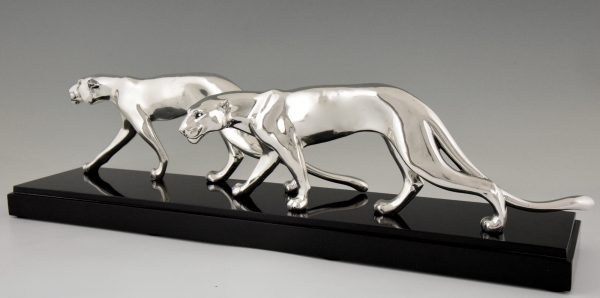 Art Deco silvered sculpture of two panthers