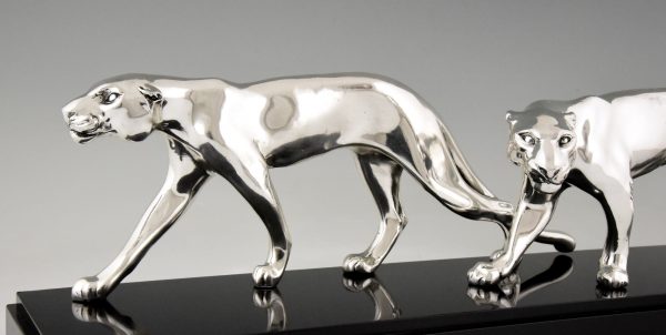 Art Deco silvered sculpture of two panthers