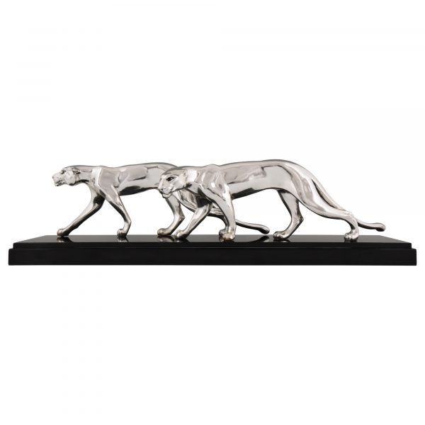 Art Deco silvered sculpture of two panthers.