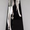 Art Deco silvered sculpture of two panthers.