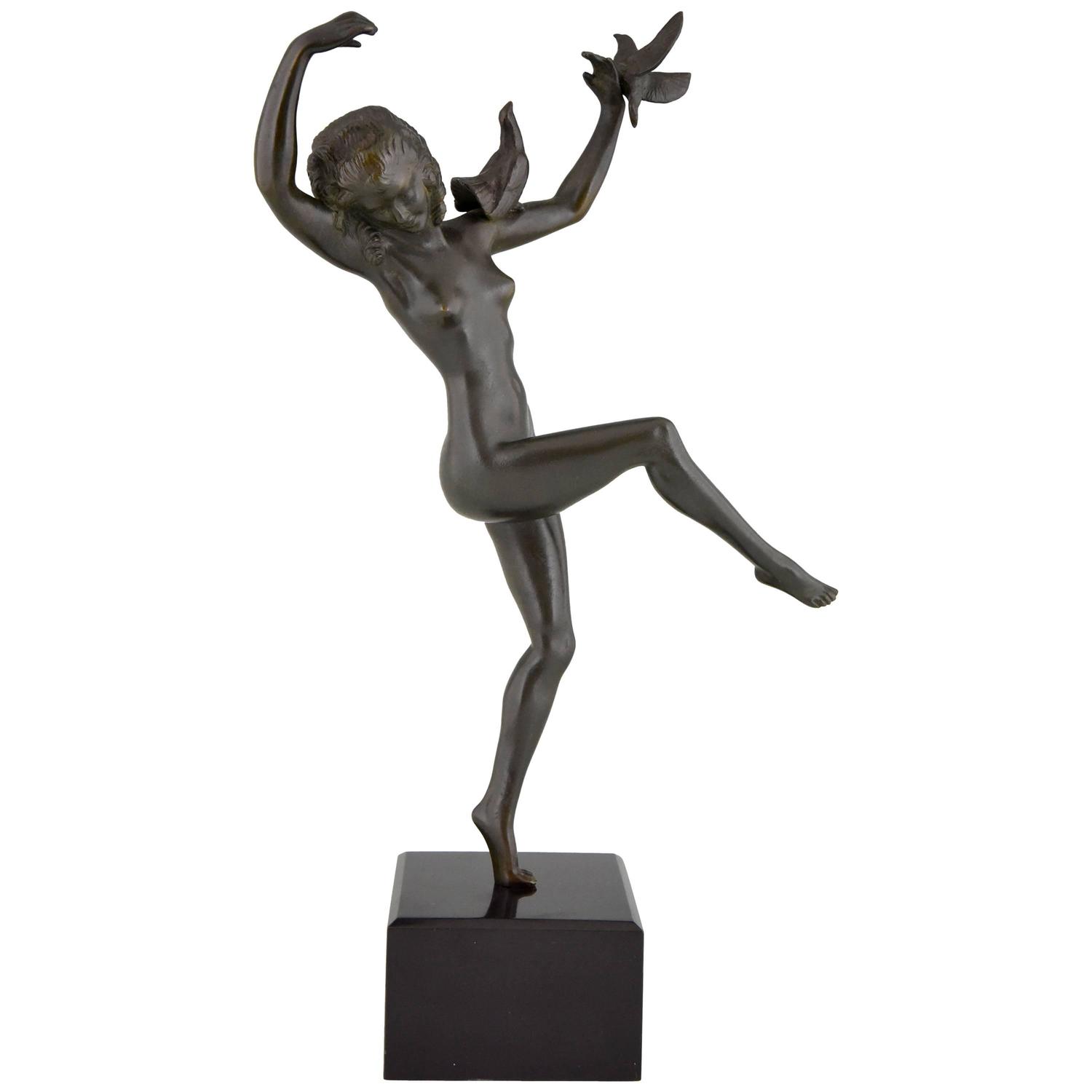 Art Deco bronze danseuse nue aux oiseaux Art Deco bronze danseuse nue aux oiseaux
