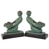 Art Deco boekensteunen naakte vrouw met mand