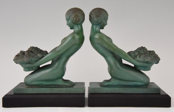 Art Deco bookends kneeling nudes with baskets.