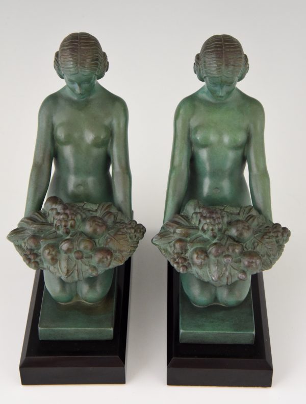 Art Deco bookends kneeling nudes with baskets.